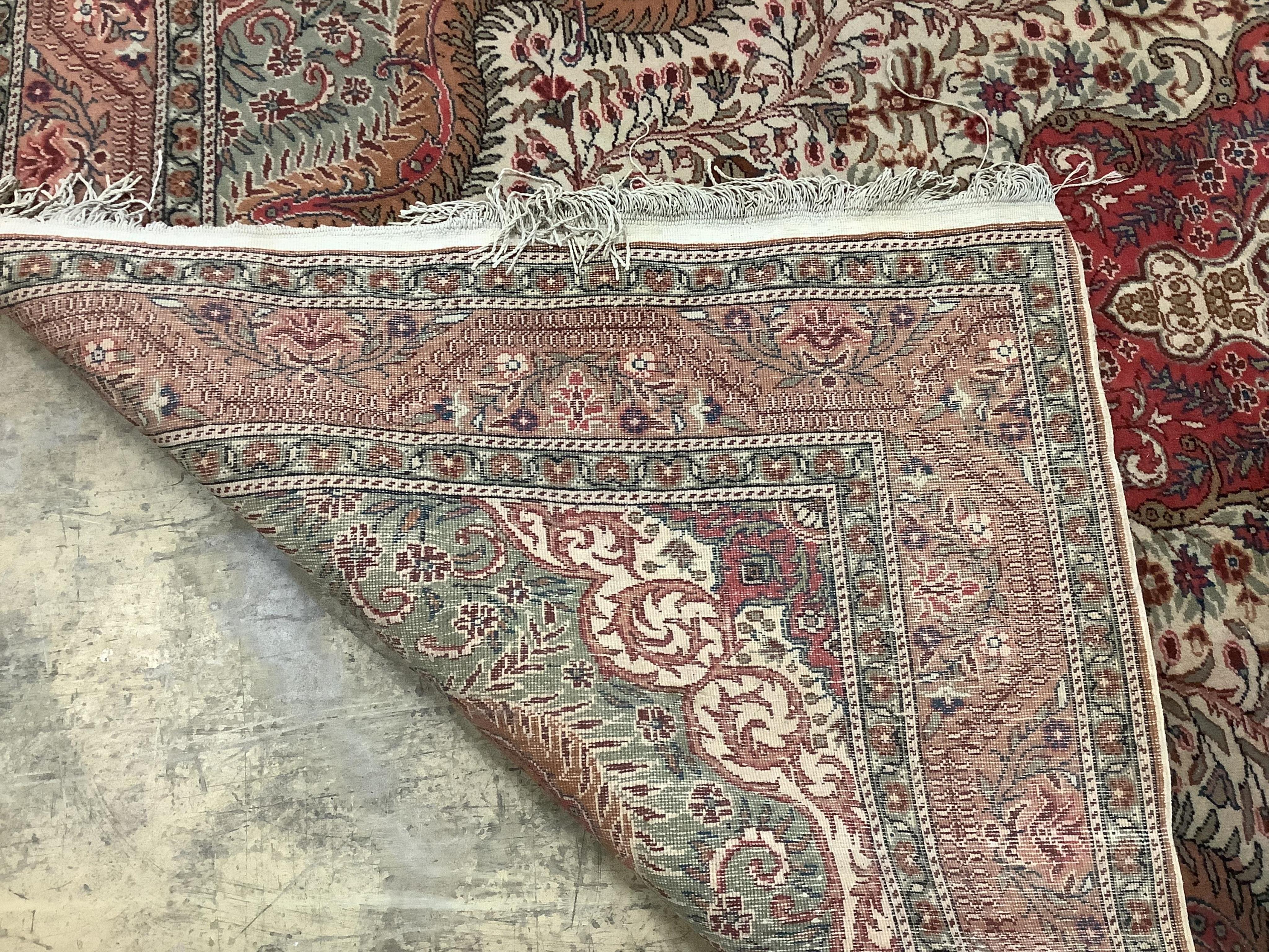 A Persian style beige ground carpet, 290 x 197cm. Condition - fair to good